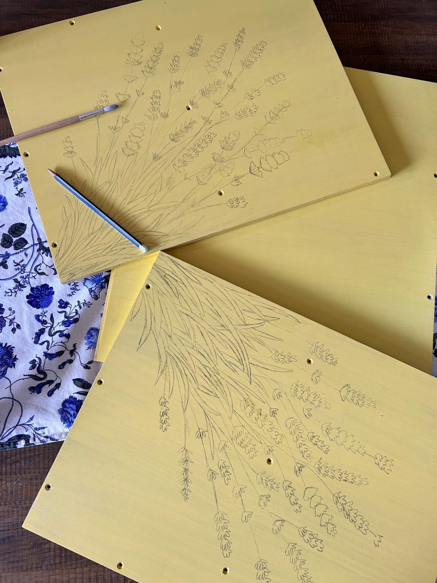 Lavender sketches on yellow panels
